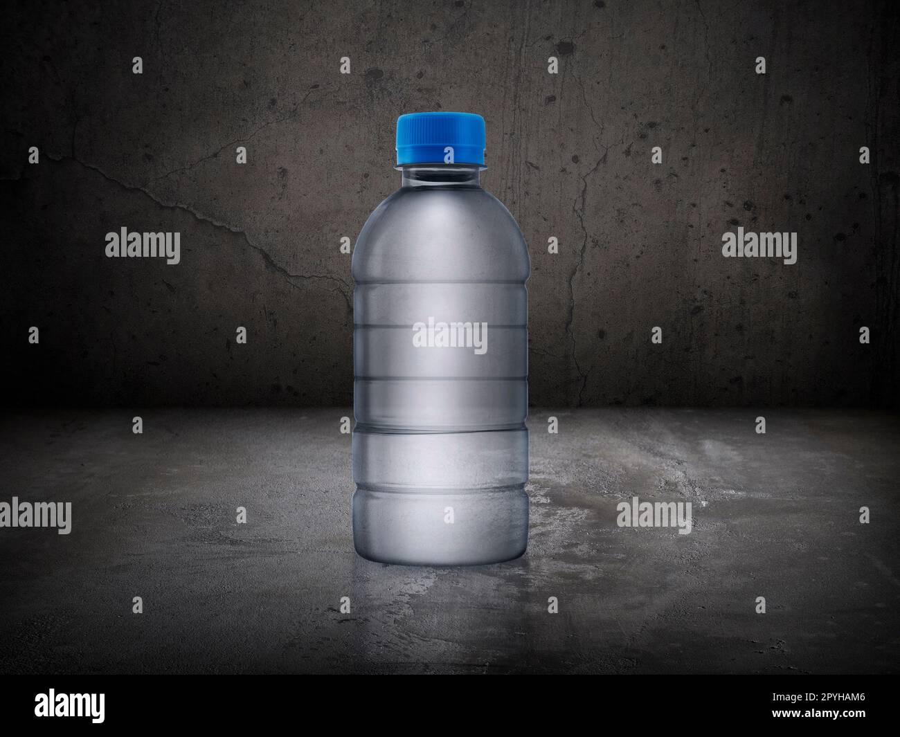 Small water bottle on old room Cement floor Stock Photo