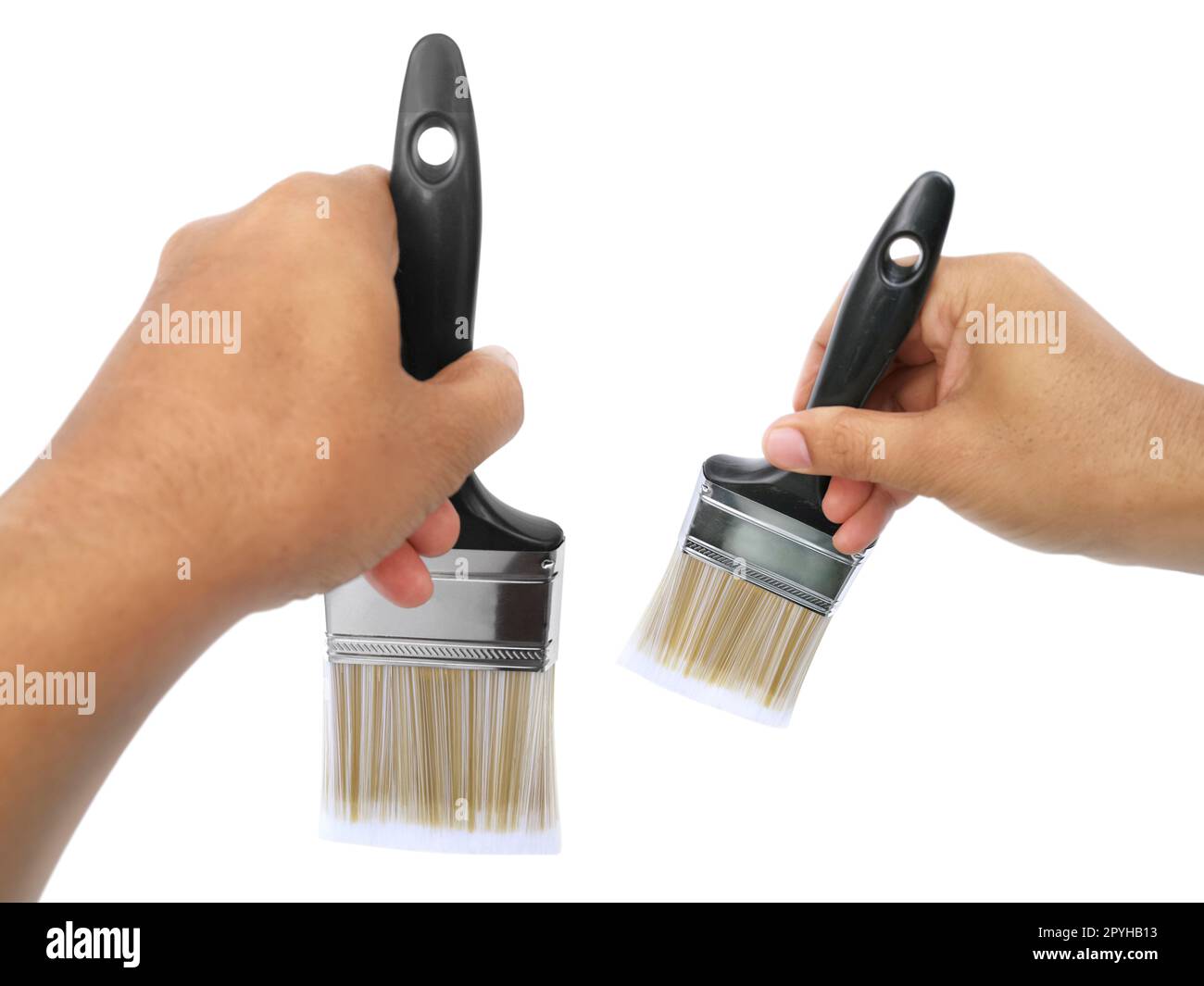 hand holding Paintbrush isolated on white background Stock Photo