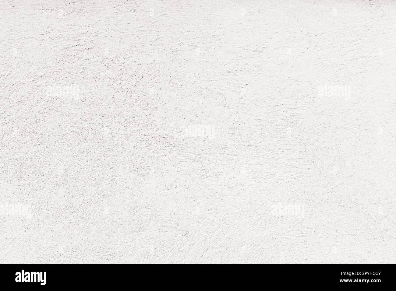 Empty concrete wall covering by white plaster. Stock Photo