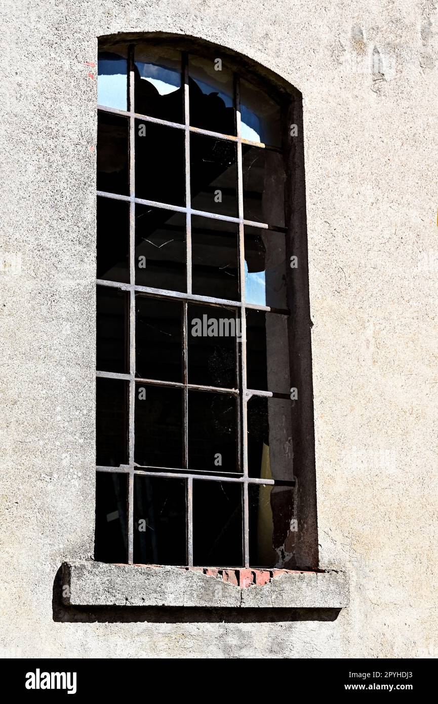 Old window with broken panes Stock Photo