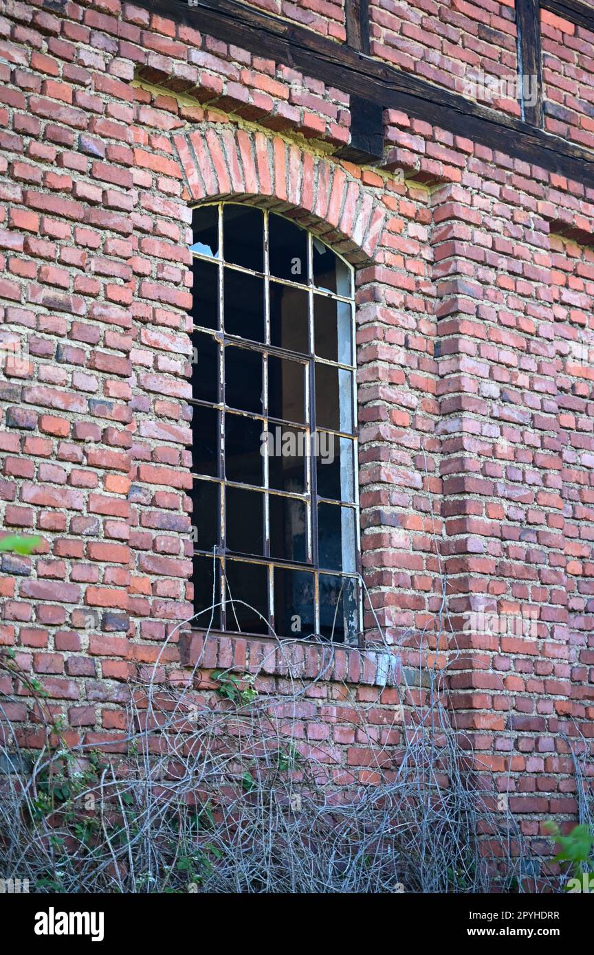 Old window with broken panes Stock Photo