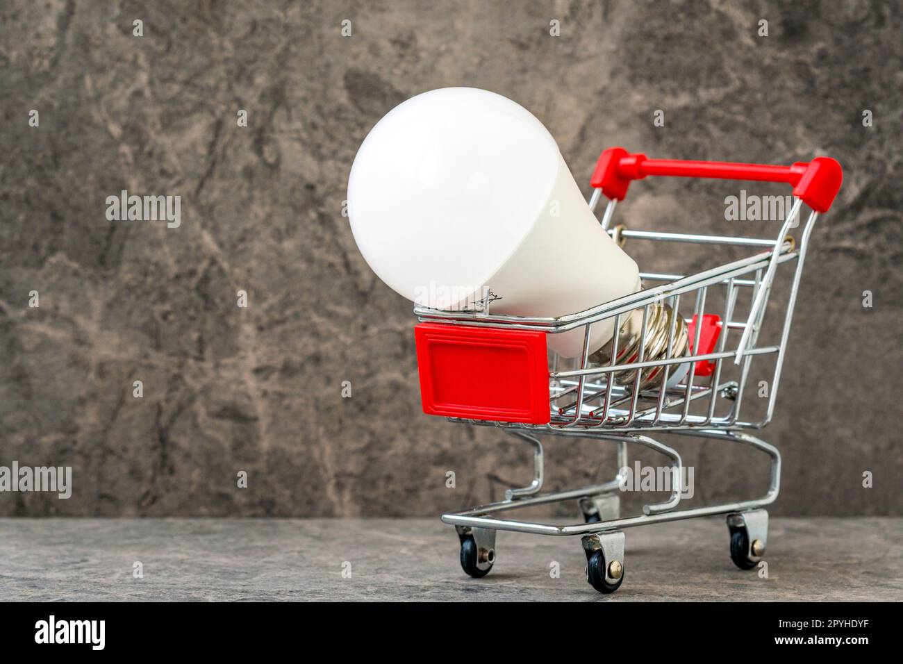 Light Bulb In The Shopping Cart Stock Photo