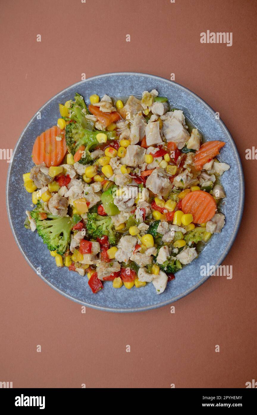 Honey soy chicken with vegetables on a plate Stock Photo