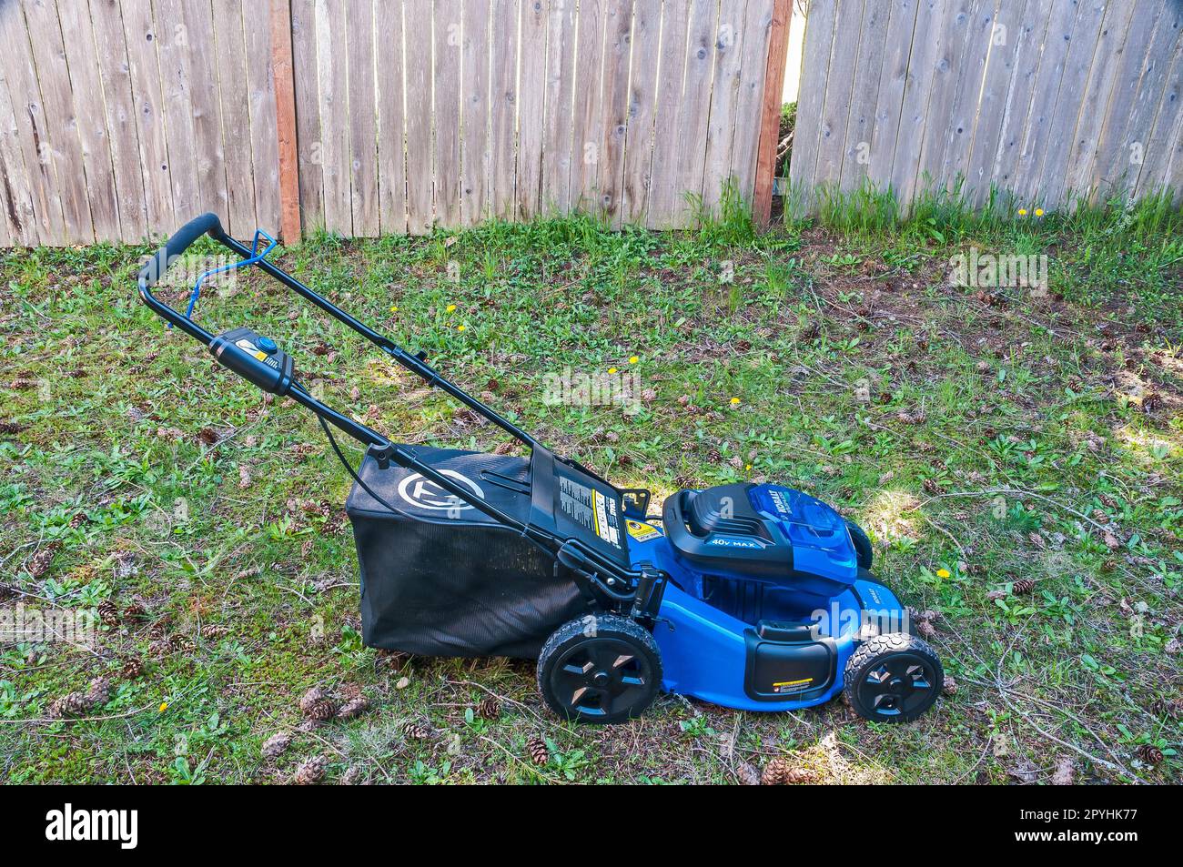 Kobalt Electric Battery-Powered Lawn Mower, Side View. Stock Photo
