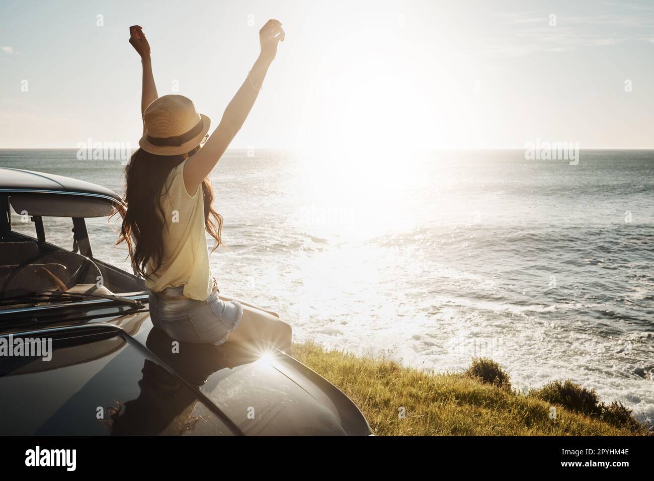 See the world in all of her beauty. a young woman enjoying a road trip ...