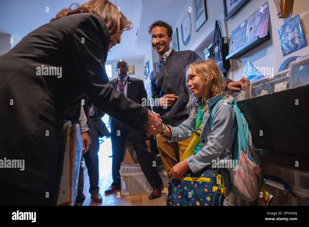 Washington, United States. 03rd May, 2023. U.S. Vice President Kamala Harris shakes hands with Esmé Pleasant as her father Zach looks on at Home Rule Record store in Washington, DC on Wednesday, May 3, 2023. Photo by Ken Cedeno/Pool/Sipa USA Credit: Sipa USA/Alamy Live News Stock Photo