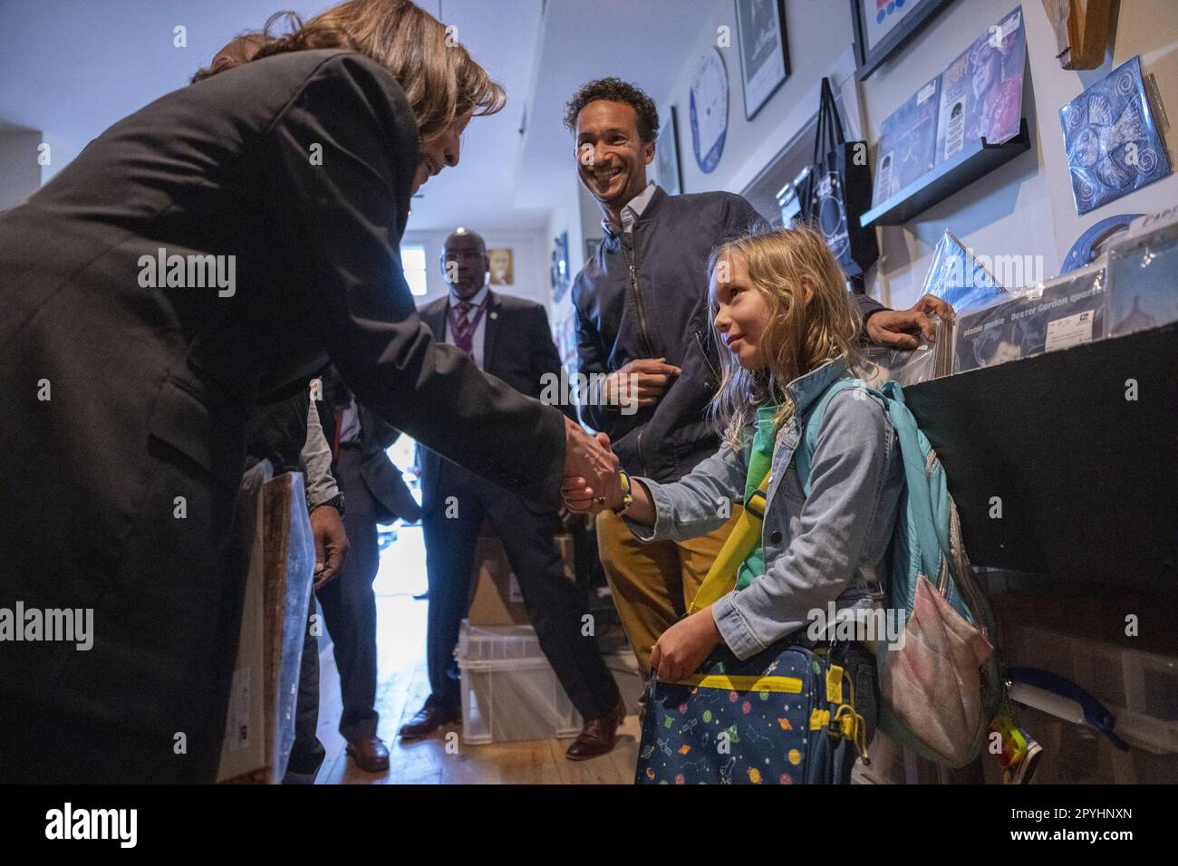Washington, United States. 03rd May, 2023. U.S. Vice President Kamala Harris shakes hands with Esmé Pleasant as her father Zach looks on at Home Rule Record store in Washington, DC on Wednesday, May 3, 2023. Photo by Ken Cedeno/UPI Credit: UPI/Alamy Live News Stock Photo