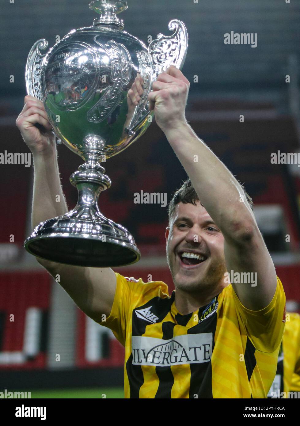 The Stadium of Light, Sunderland, Tyne and Wear, England 3rd May 2023. Hebburn Towns' Robbie Spence lifts the Durham Challenge Cup after beating Spennymoor Town in the final Hebburn Town V Spennymoor Town, in the Durham Challenge Cup Final Stock Photo