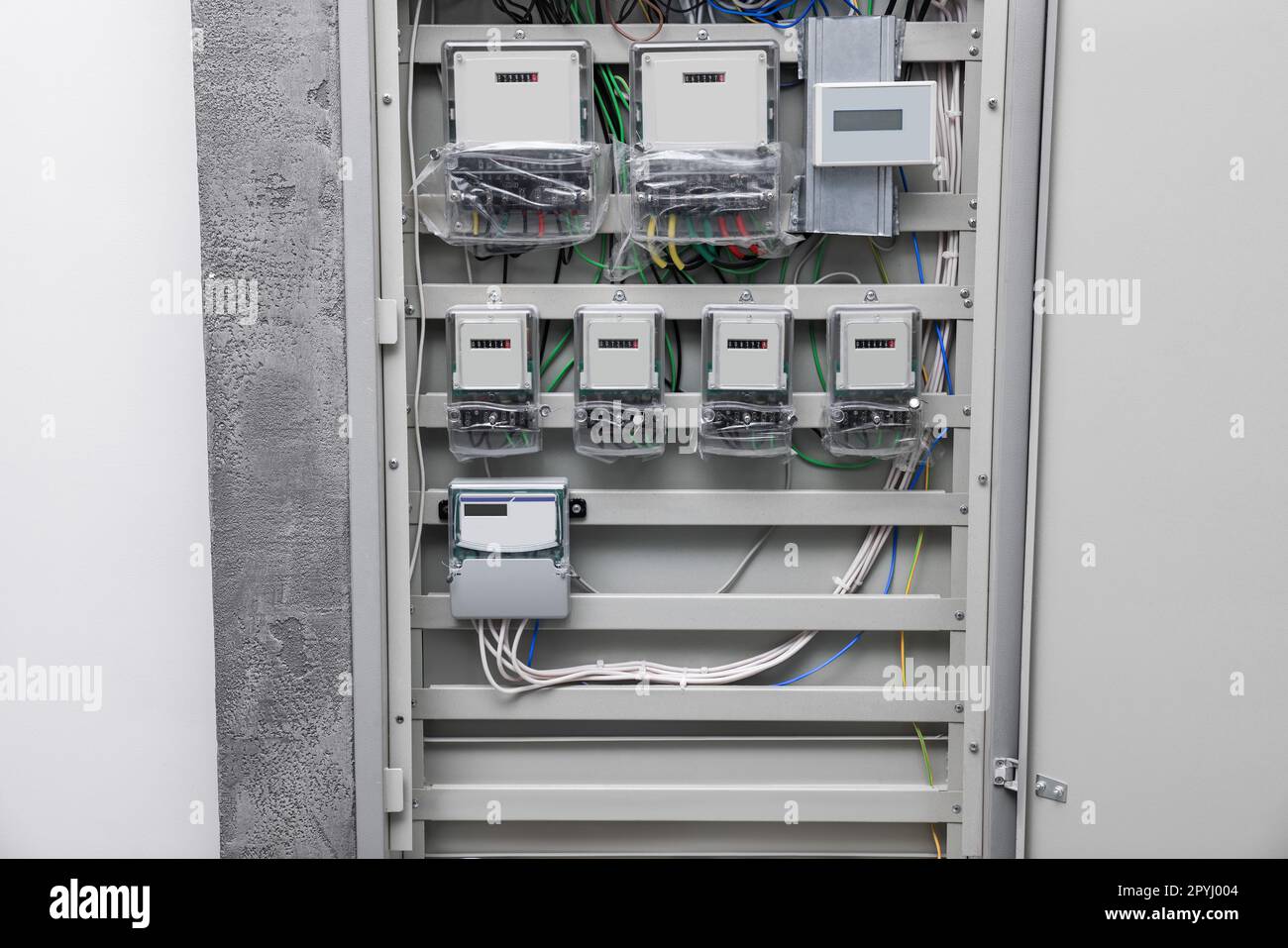 Fuse box with many electric meters and wires Stock Photo Alamy