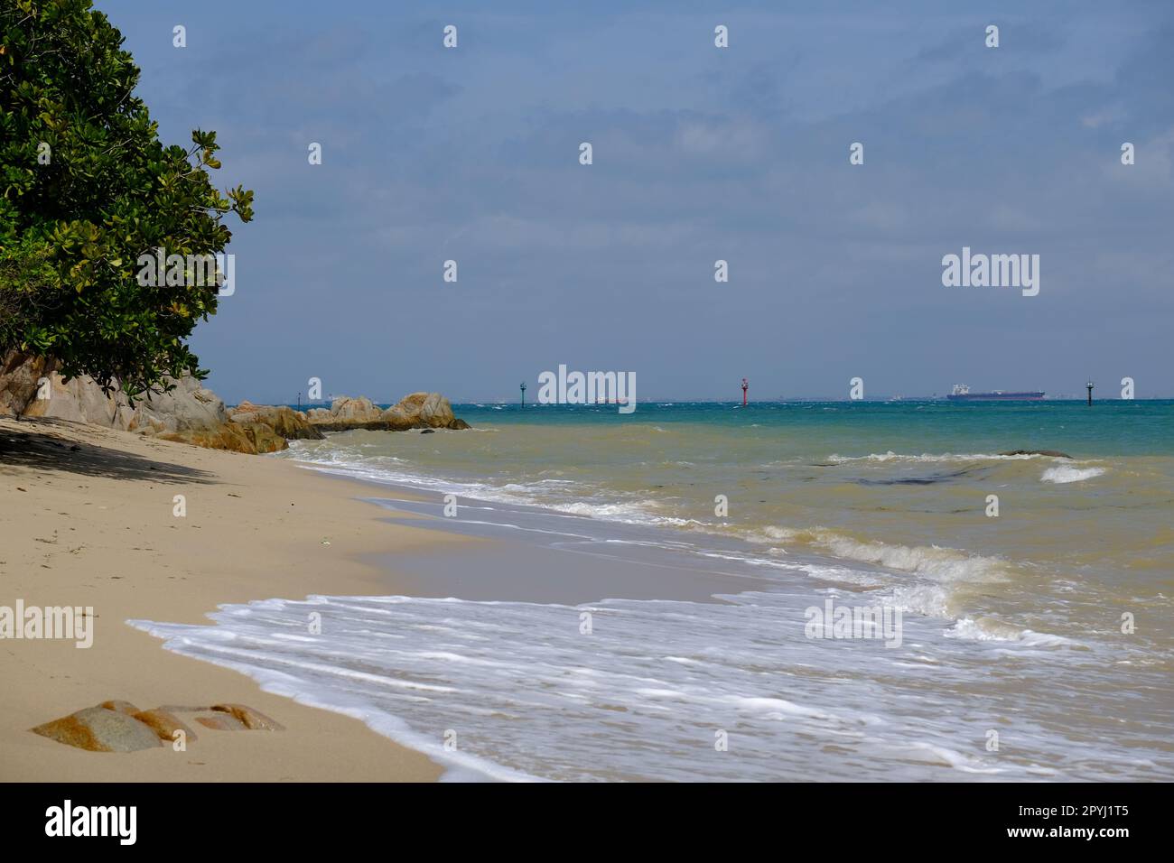 Indonesia Batam - Beach at Nongsa Point Rocks - Nongsa Beach Stock Photo