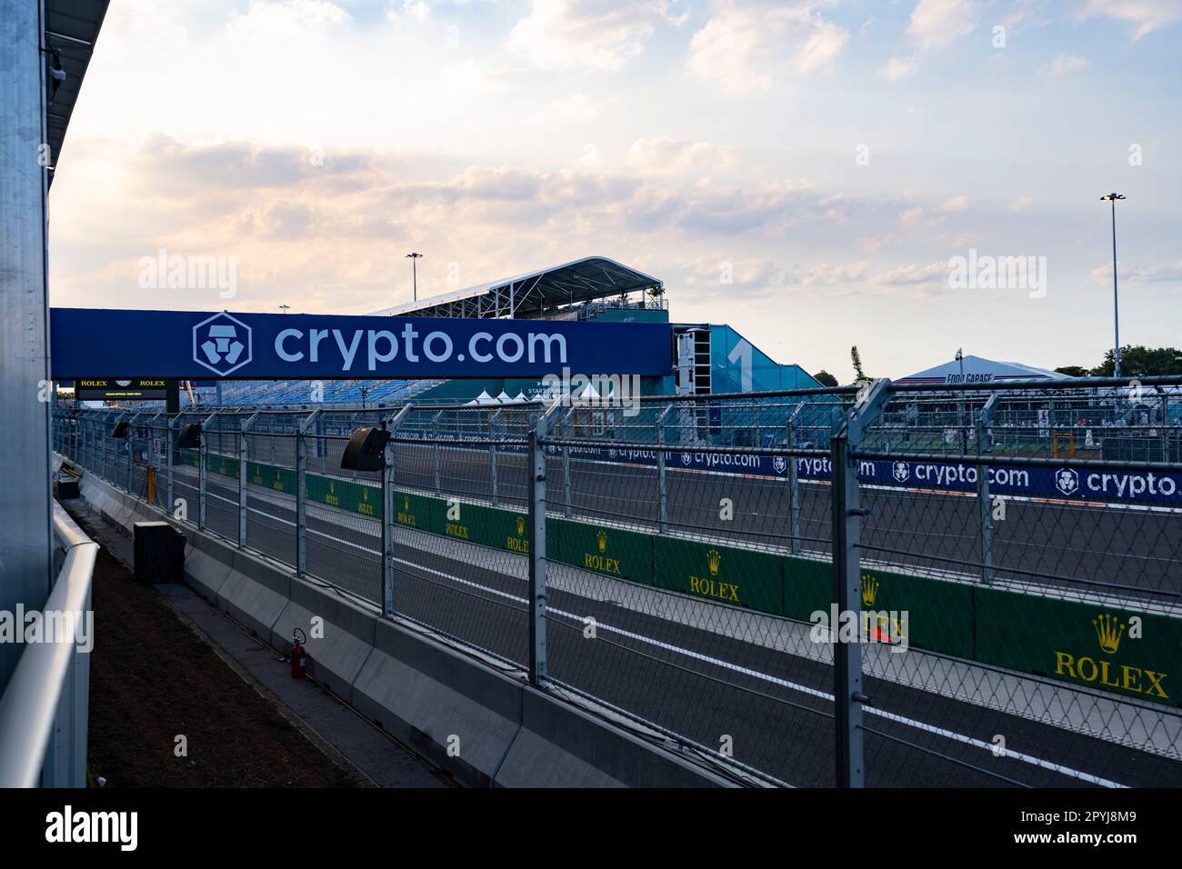 Dogecoin cryptocurrency coin held in a hand. Dogecoin is a cryptocurrency,  a digital currency Stock Photo - Alamy