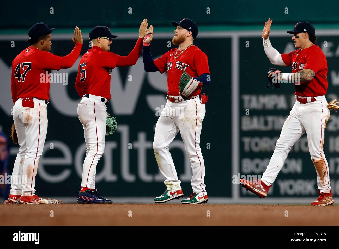 Boston Red Sox players, from left, Enmanuel Valdez, Enrique