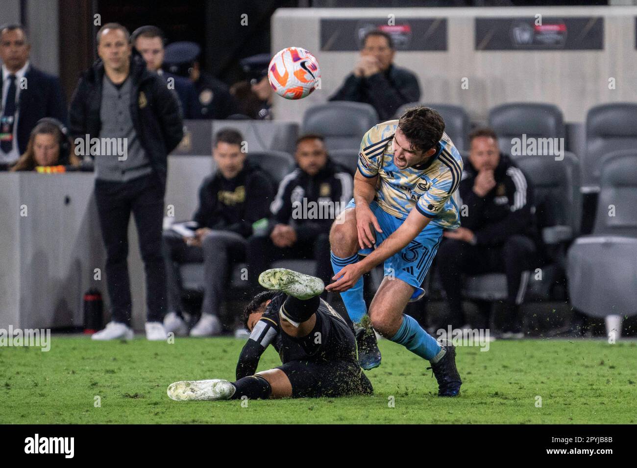 Philadelphia Union midfielder Leon Flach (31) is fouled by LAFC forward Carlos Vela (10) during a CONCACAF Champions League semi-final match, Tuesday, Stock Photo