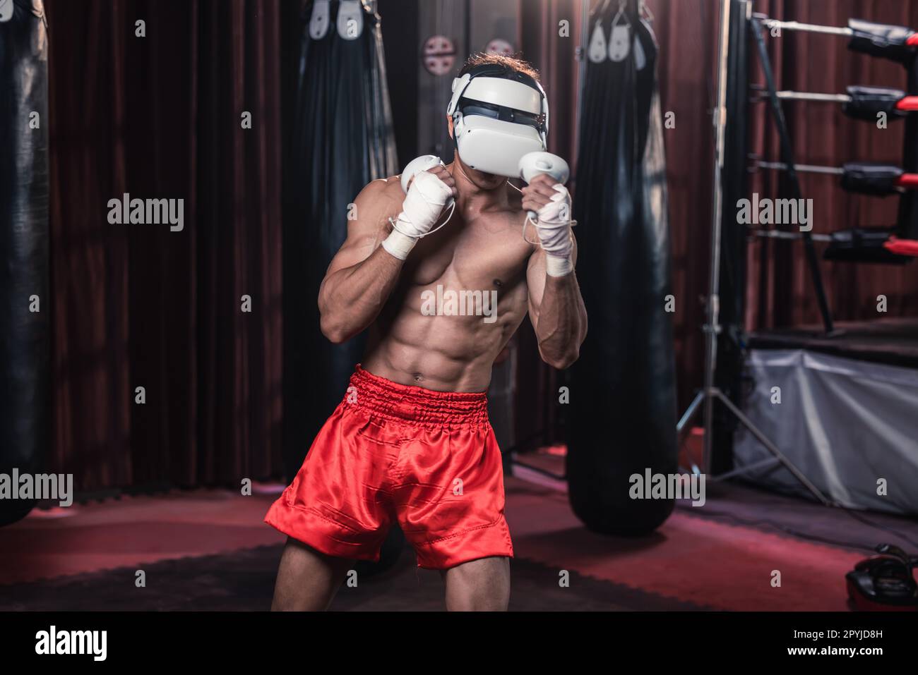 Professional boxer wear virtual reality headsets to engage in immersive
