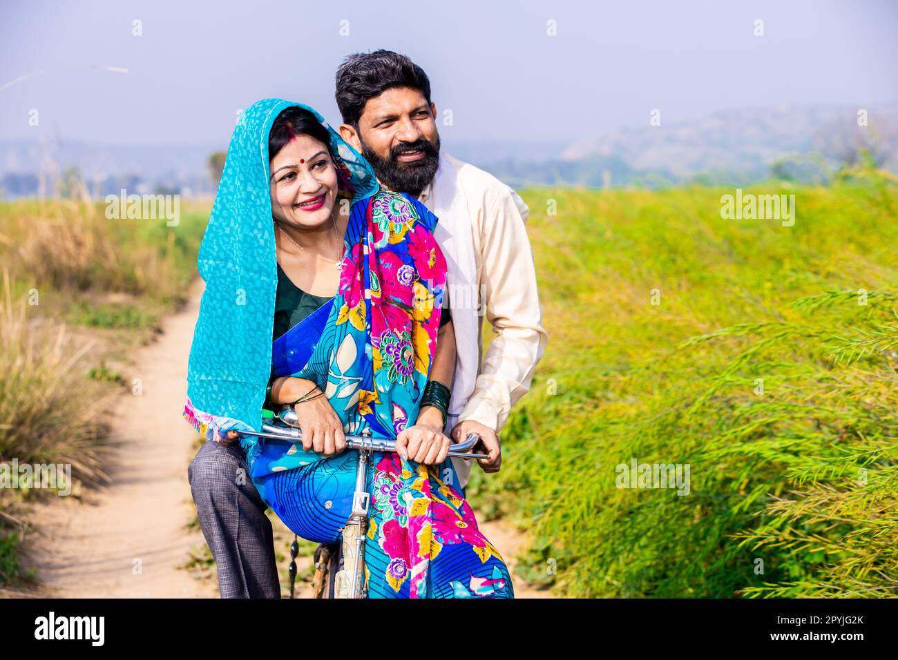 Indian rural family cycle hi-res stock photography and images - Alamy