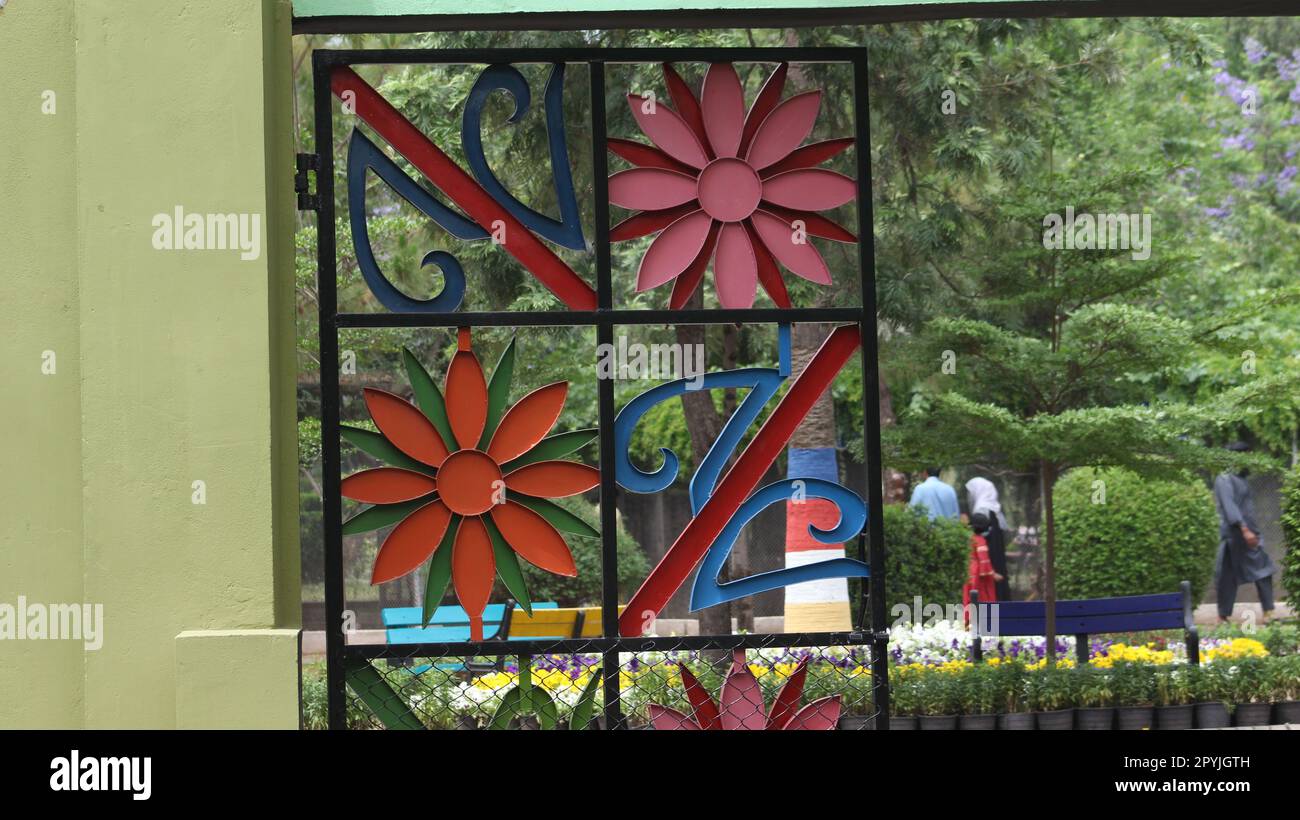 flowers gate on a garden Stock Photo