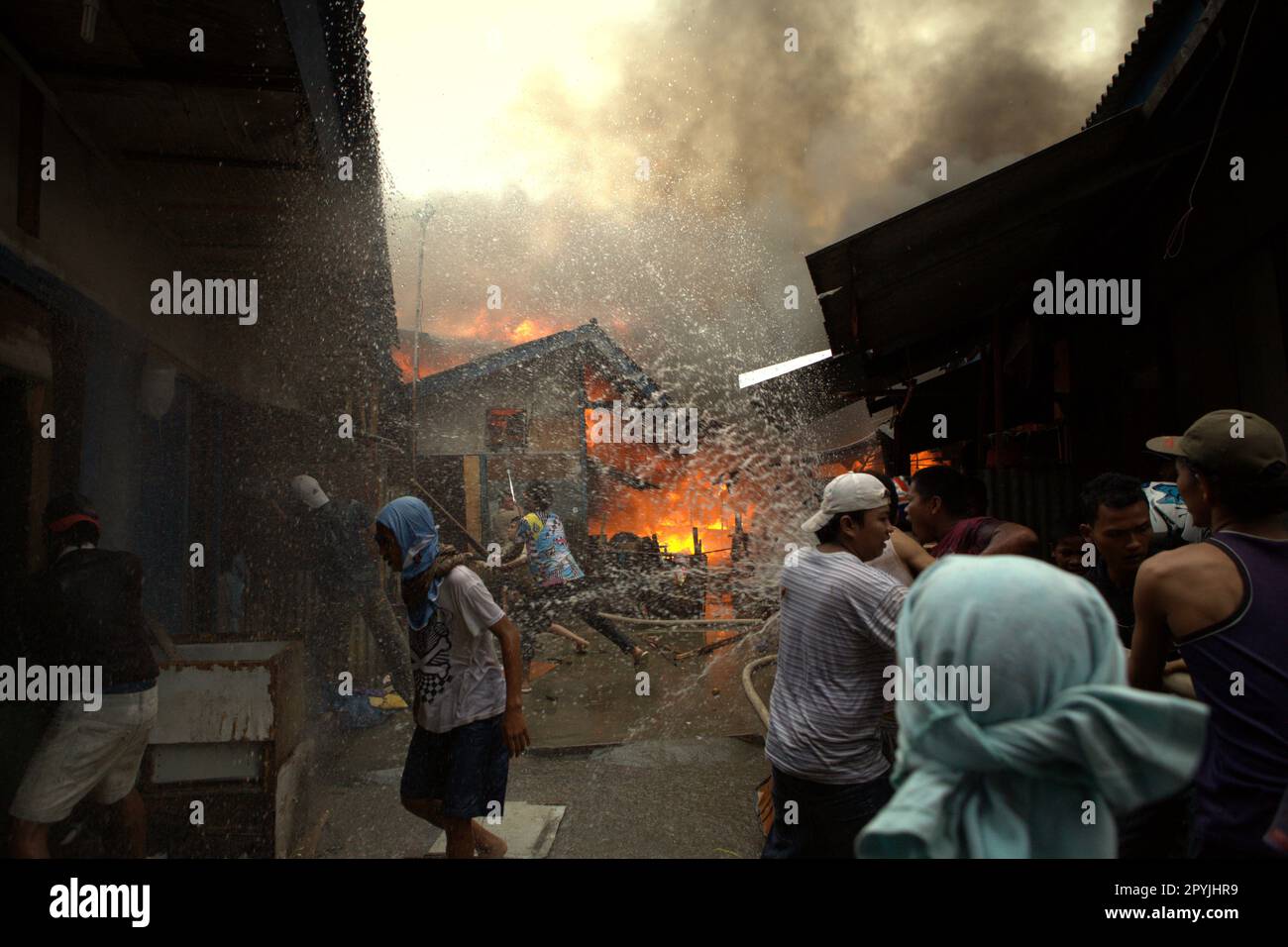 Local People Trying To Bring Down Houses To Avoid The Fire From ...