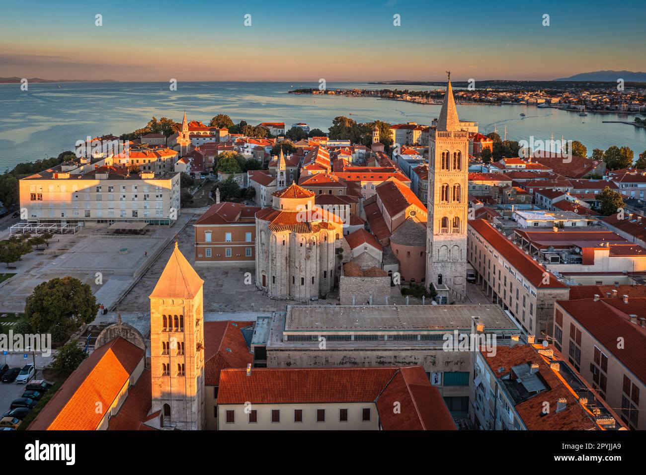 Zadar, Croatia - Aerial view of the old town of Zadar by the Adriatic sea with Church of St. Donatus and the Cathedral of St. Anastasia and blue sky Stock Photo