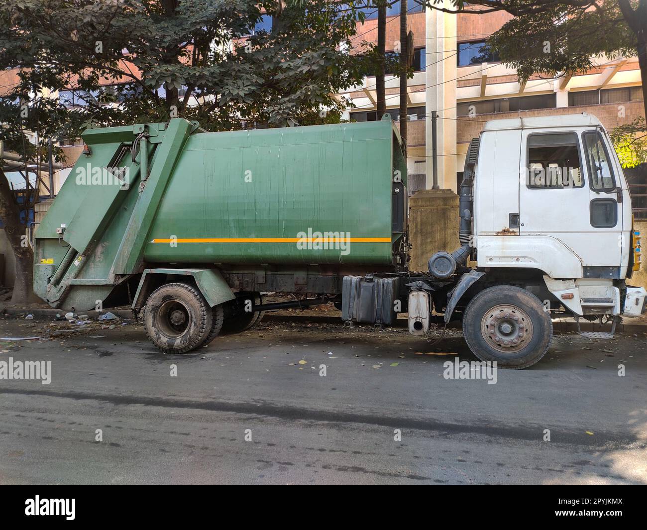 Garbage truck, urban recycling waste and garbage services Stock Photo Alamy