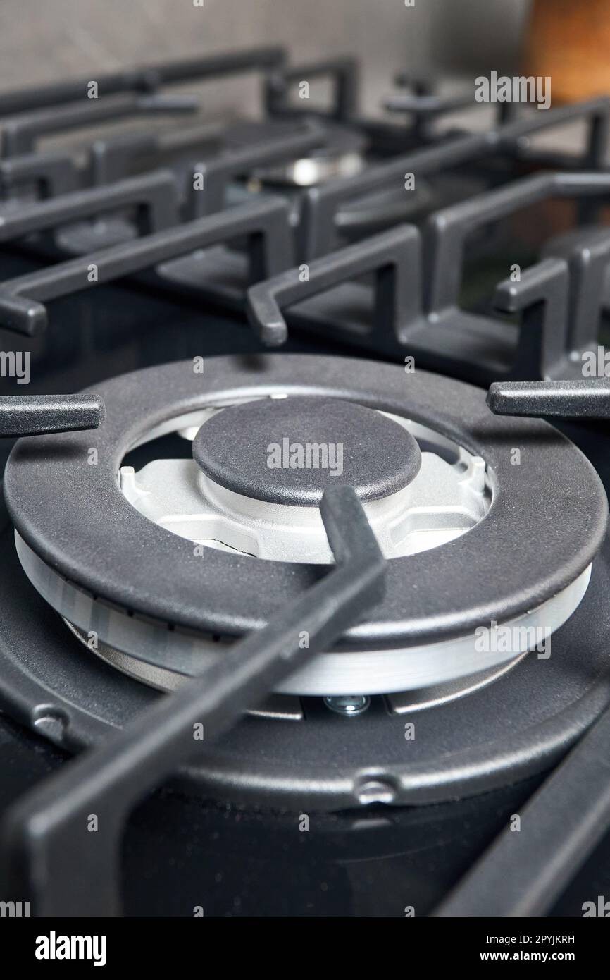 Wok burner with auto ignition of contemporary black tempered glass gas