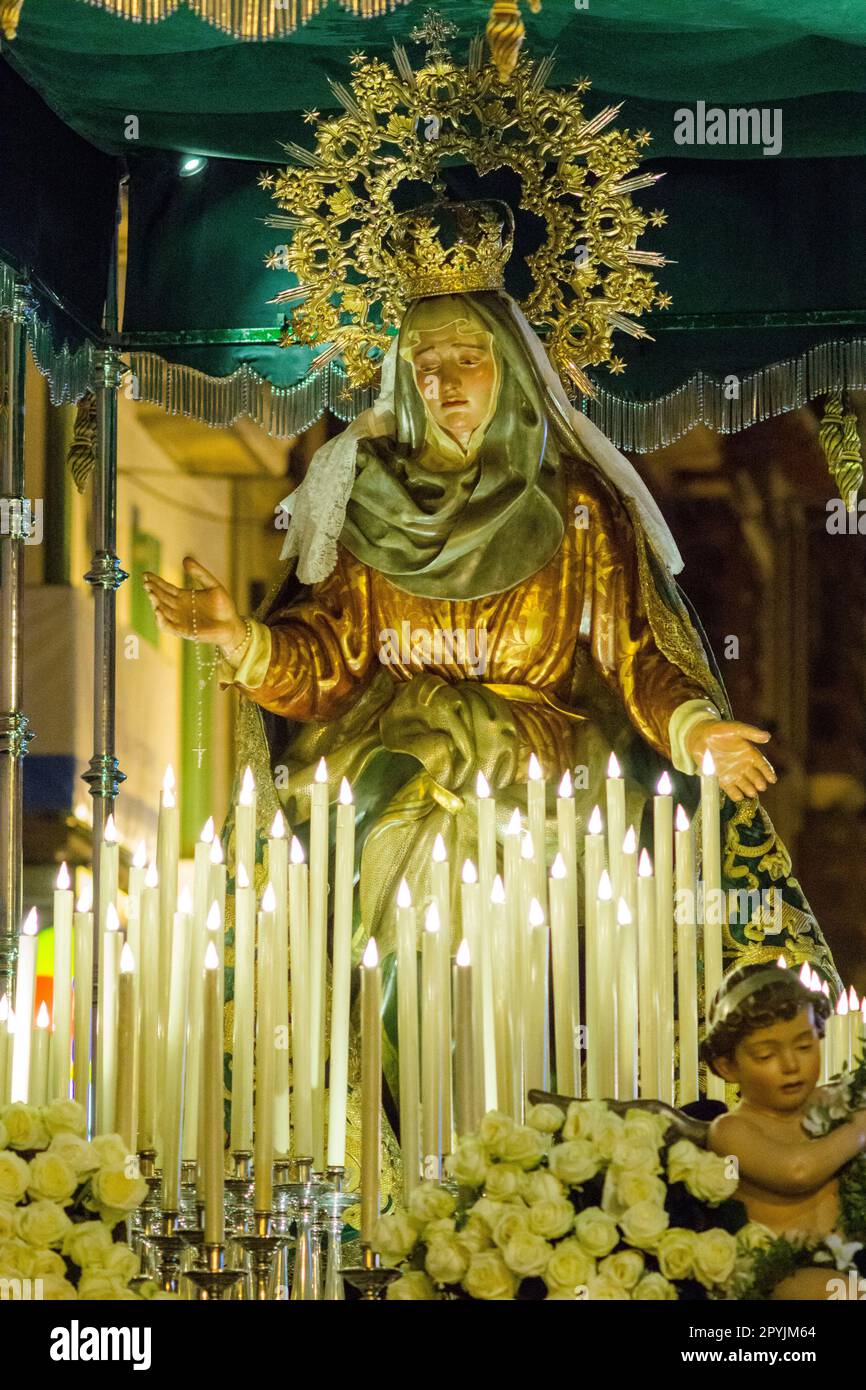 cofrades en la calle San Miquel, procesion de jueves santo, Palma, Mallorca, Islas Baleares,  España Stock Photo