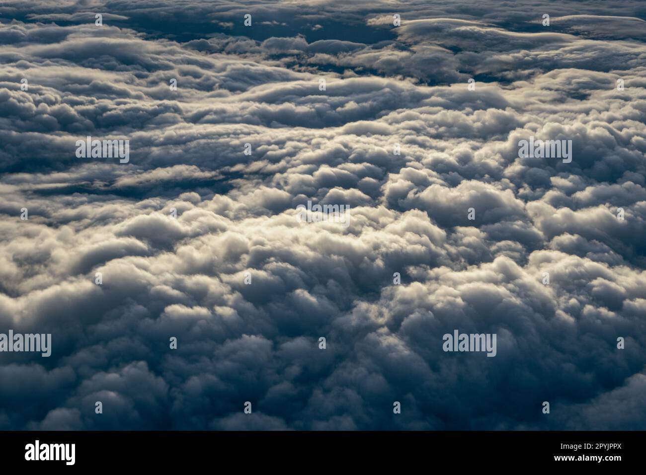 Aerial view of puffy white clouds in the sky with copy space Stock ...
