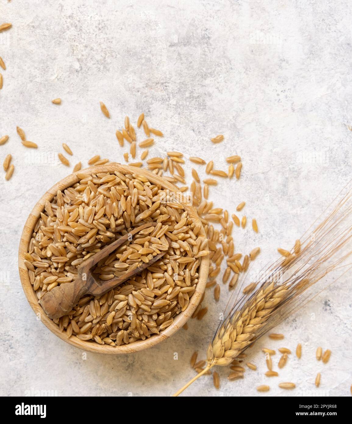 Uncooked Rye Dry food grain ingredient pile raw uncooked white wooden hi-res stock ...