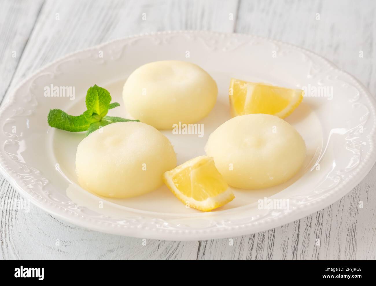 Lemon mochi - Japanese rice cake on the serving plate Stock Photo