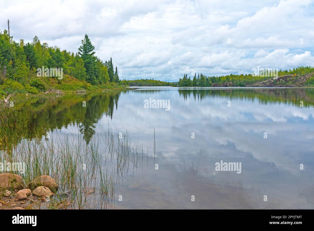 Calm Waters on a Wilderness Lake Stock Photo