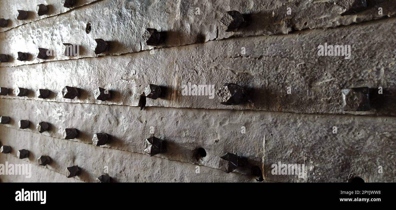 Small round pimple door. Texture for background. Forged products. Kalemegdan Fortress, Belgrade. Serbia Stock Photo