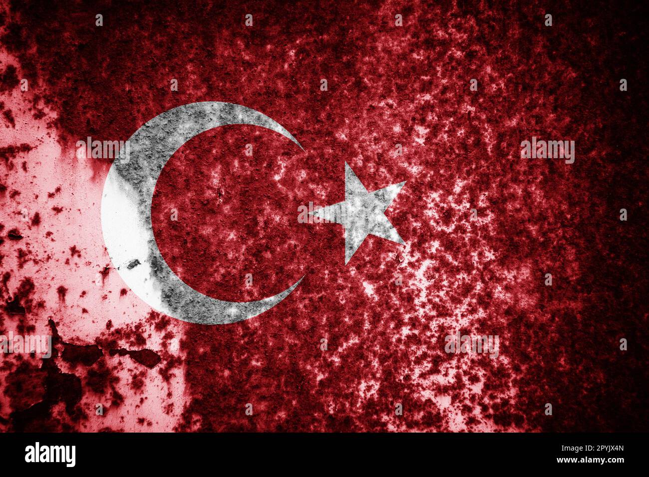 Old cracked wall with the flag painted Stock Photo