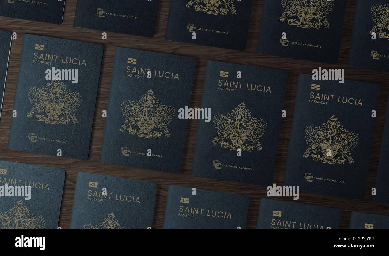 New Saint Lucia passports on a wooden background Stock Photo
