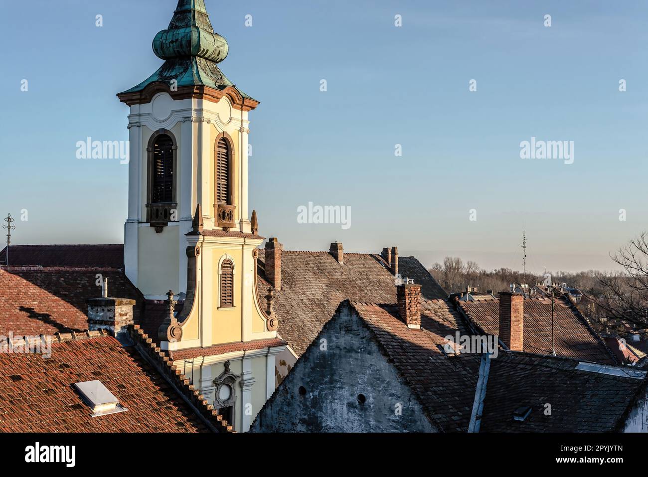 View of Blagovestenska church among old tile roofs. Szentendre, Hungary Stock Photo