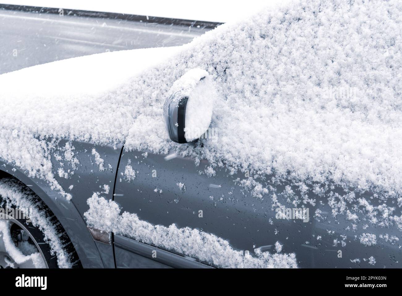 The car is a completely covered snow Stock Photo