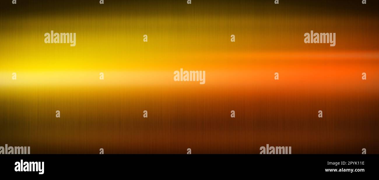 Colorful shiny brushed metal. Gradient from yellow to red. Banner background texture Stock Photo