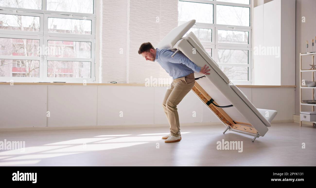 Men Carrying Furniture. Moving Sofa Stock Photo Alamy