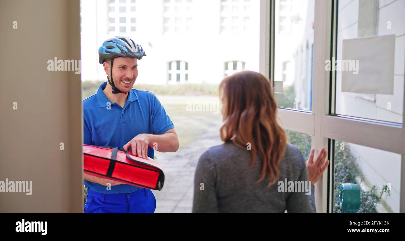 Pizza Delivery Man Giving Pizza Boxes Stock Photo Alamy