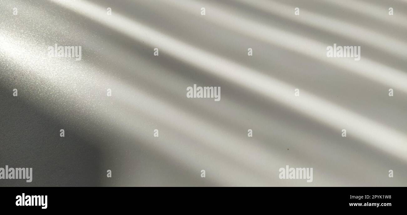 blurred striped gray background. Play of light and shadow. Light beams. Gray and silver shades with white dots and shining stars Stock Photo