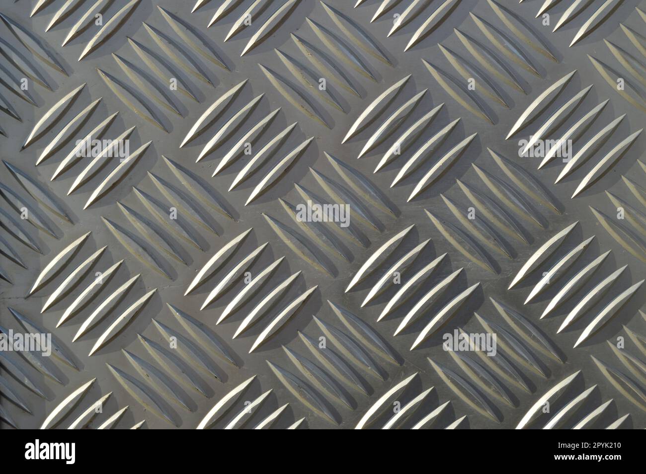 Background of metal with repetitive patterns diamonds Stock Photo