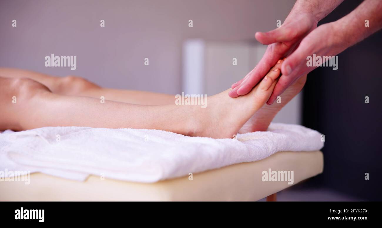 Reflexology Foot Massage Treatment Stock Photo