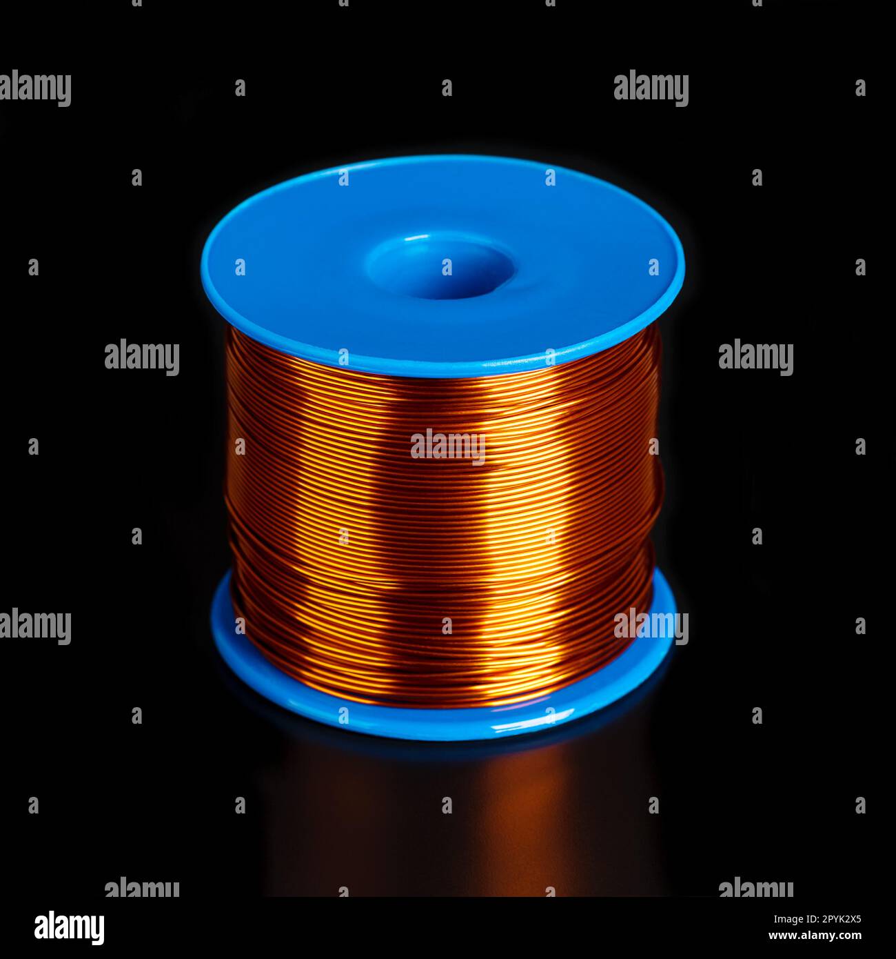 Coil with copper wire, enamelled and insulated copper winding wire Stock Photo