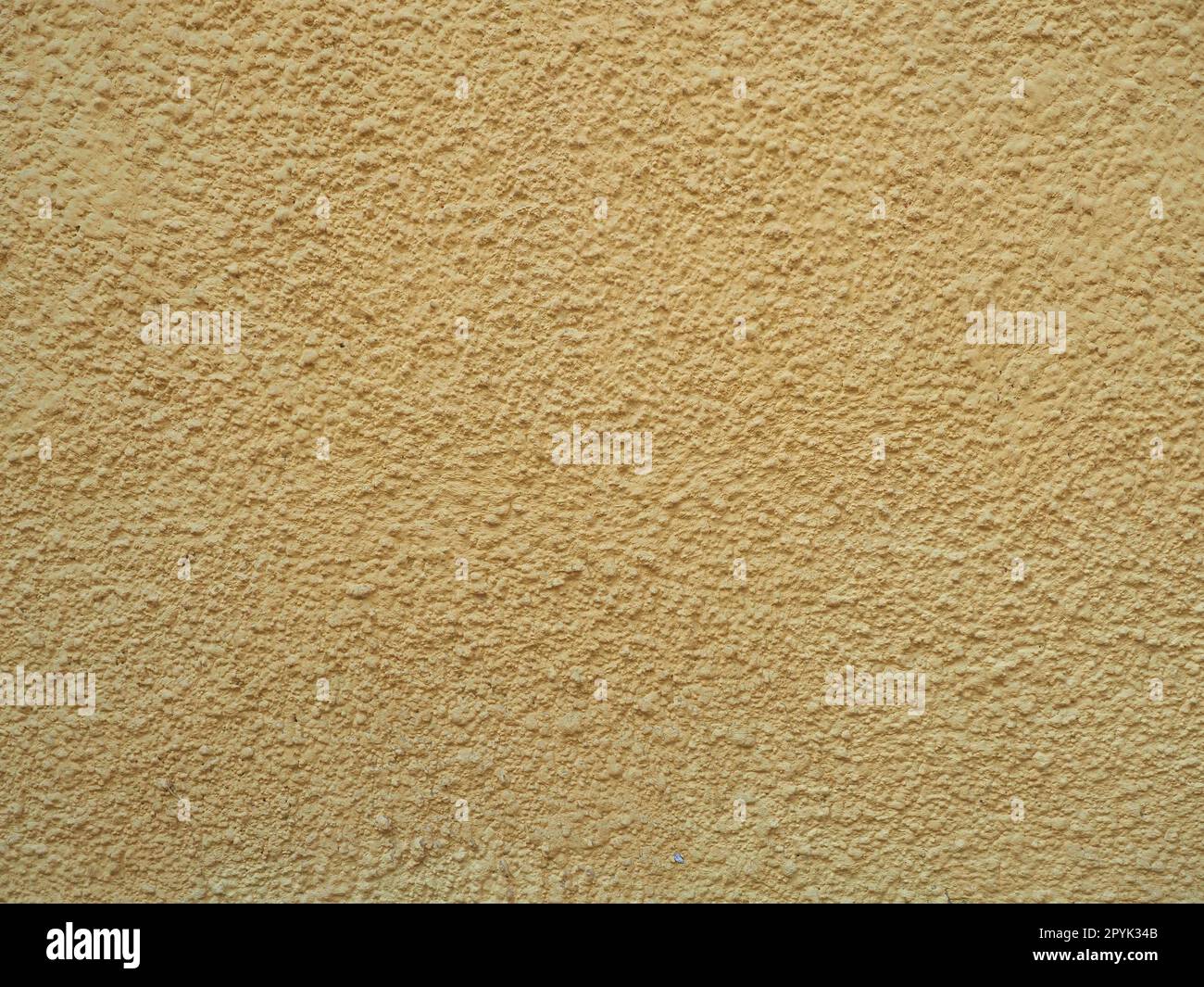yellow plaster texture useful as a background Stock Photo