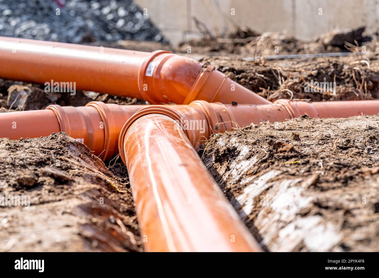 plastic pipe for sewage network in the base plate at the construction
