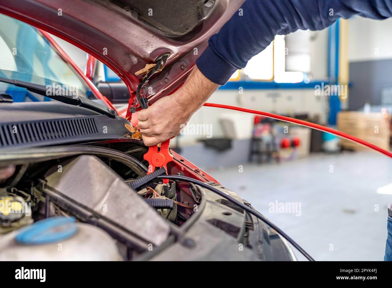 starting the car engine using the starter cable Stock Photo Alamy