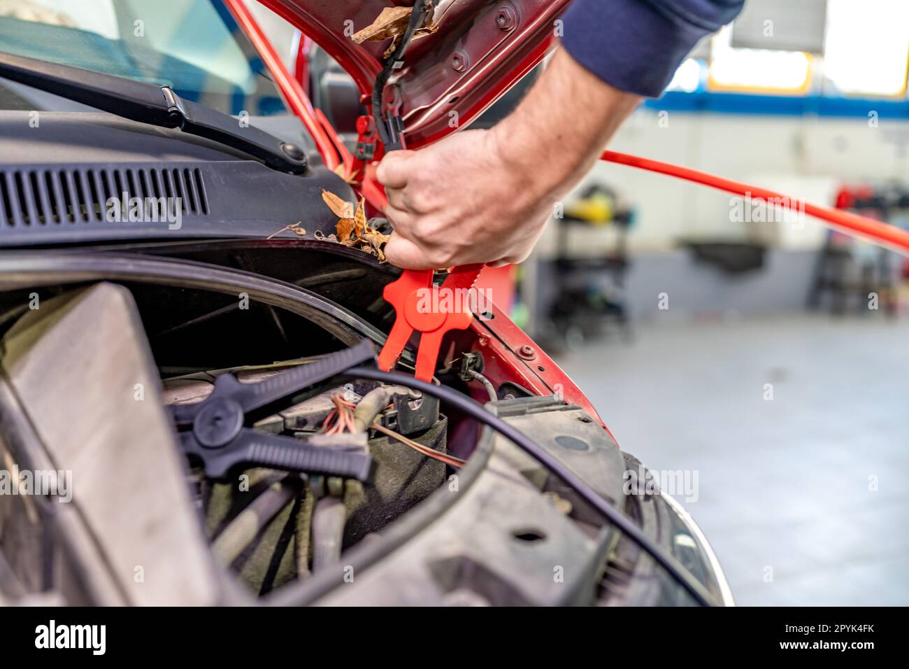 starting the car engine using the starter cable Stock Photo Alamy