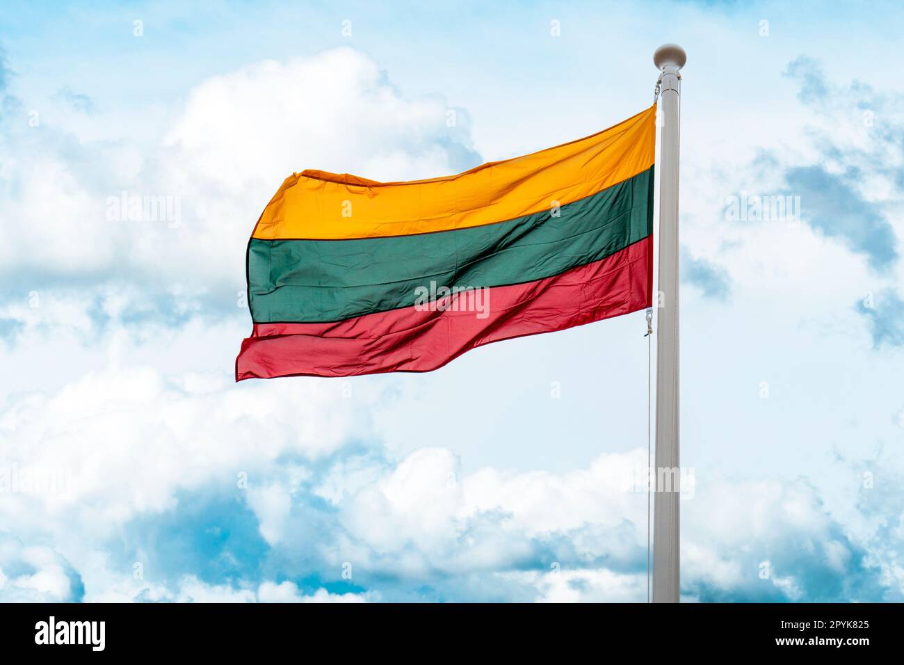 Lithuanian national flag waving on wind Stock Photo