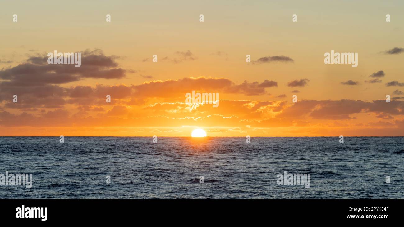 dreamlike sunset panorama on the open wide sea Stock Photo