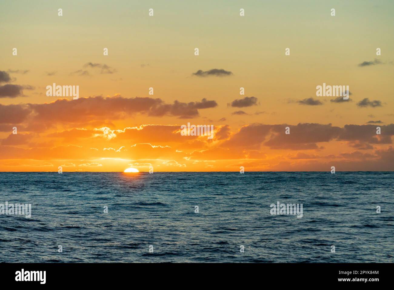 dreamlike sunset panorama on the open wide sea Stock Photo