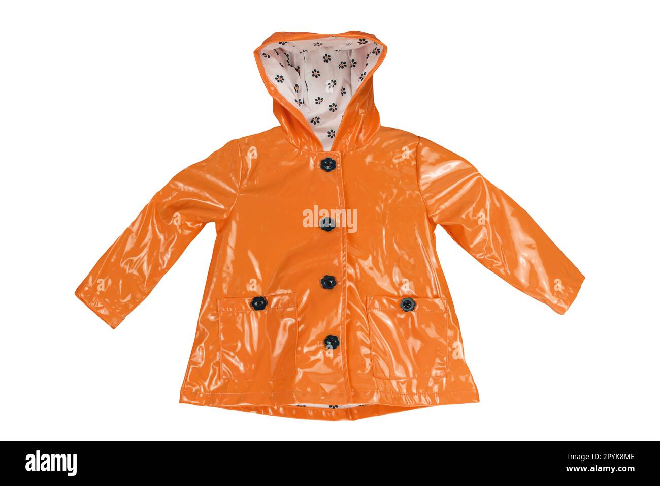 Rain jacket. Close-up of a elegant orange rain jacket isolated on a white background. Clipping path. Girls fashion for rain season. Spring and autumn clothing. Stock Photo