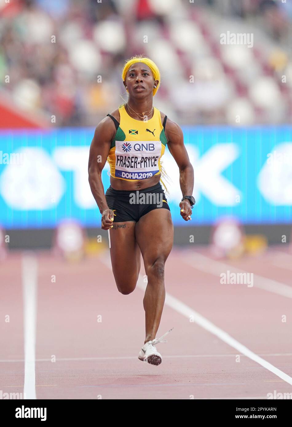 ShellyAnn FraserPryce running the 100m at the 2019 World Athletics Championships in Doha Stock